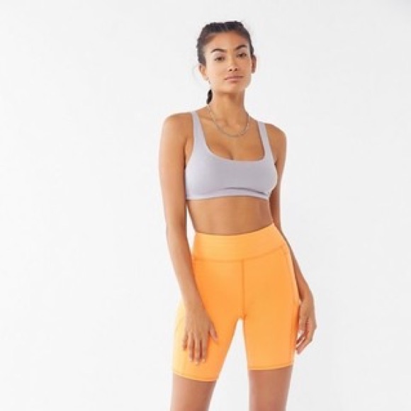 UO Seamed Biker Short in Coral - Picture 1 of 5
